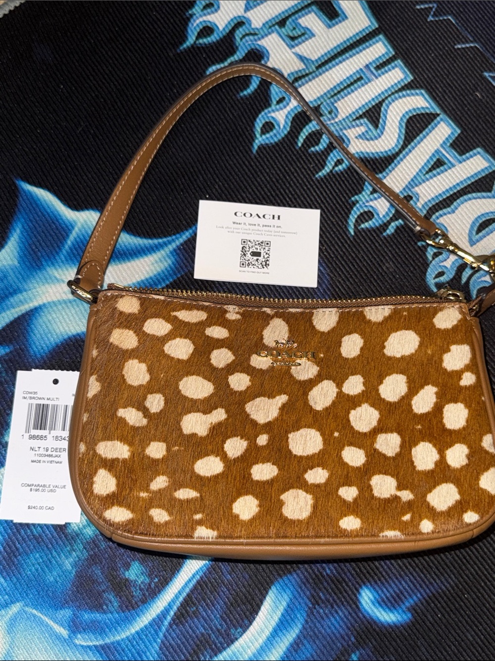 Coach Brown and Cream Spotted Haircalf Wristlet Nolita 19 With Deer Print